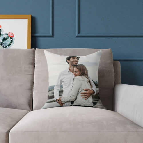 Personalized photo pillow styled on a sofa — unique anniversary gift for couples